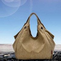 Discovery Journey Canvas Shoulder Bag with FREE Mini Umbrella(D0102HE6UUY.)