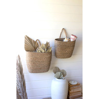 SET OF TWO TALL OVAL WOVEN SEAGRASS BASKETS
