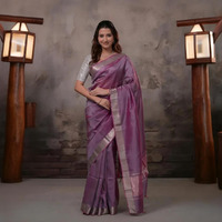 Bhadra - Pinkish Purple Plain Handwoven Silk Saree With Silver Zari Border