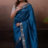 Bhadra - Indigo Blue Plain Handwoven Silk Saree With Silver Zari Border