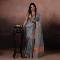Bhadra - Powder Blue Plain Handwoven Silk Saree With Copper Zari Border