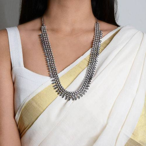 Step out in style with this beautiful oxidised silver plated earrings, which have been given a drop designer dangler perfectly designed. It will add bling to your look. This earring will go well with any of your ethnic outfits.