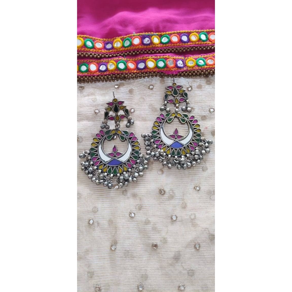 Outstanding German Silver long pendant necklace & drop earrings set. Carved floral design with crescent moon embellishments looks gorgeous. Contemporary look which will fit with your whole wardrobe It falls beautifully on the neckline giving you an elegant look. We trust our products and will never sell anything that we won't use ourselvesThis set includes choker necklace, stud earrings, ring and nose pin