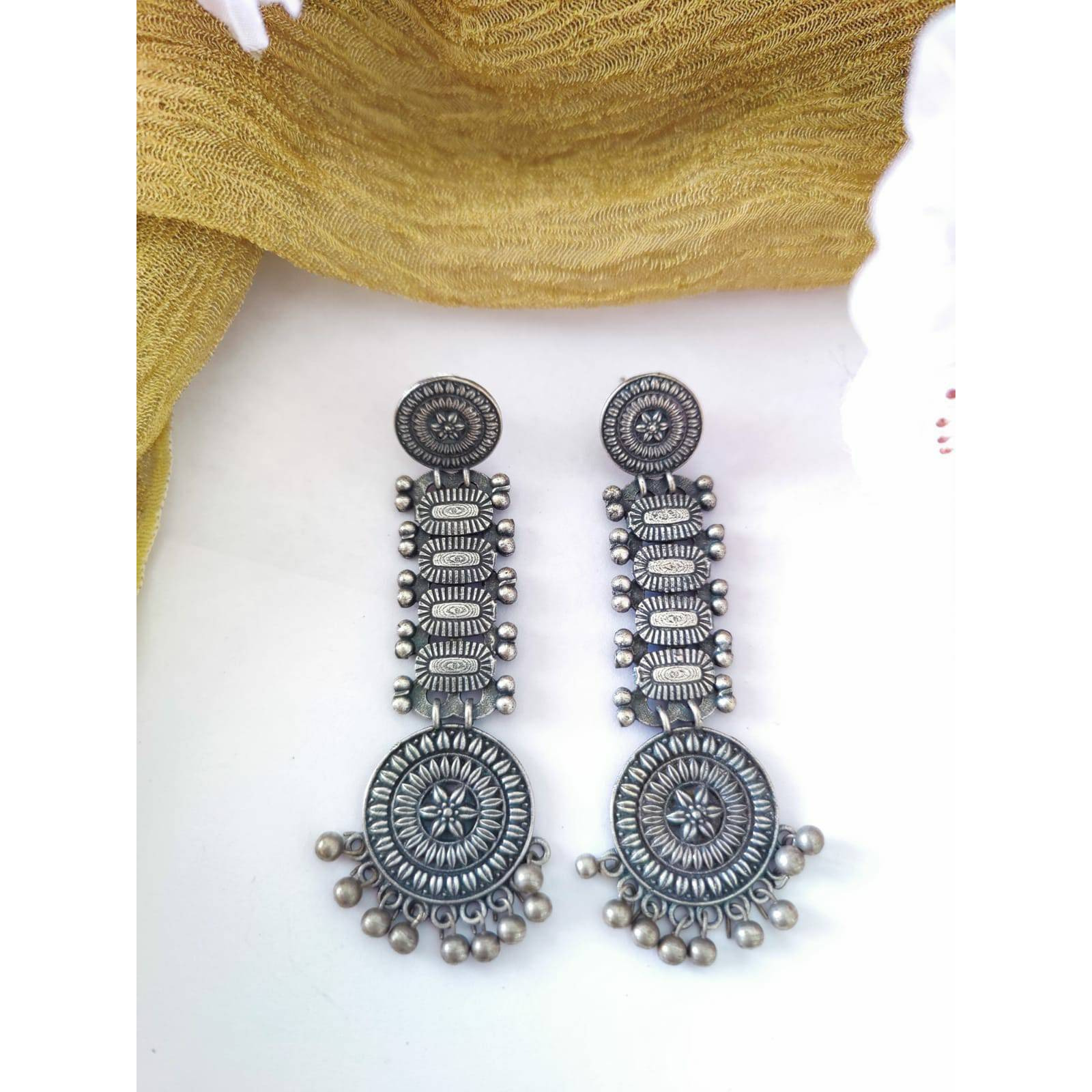 This is a beautiful pair of zircon stud earrings. The pack comes with one pair of beautiful studded oxidized earrings. You can choose from any of the two options provided. This pair will work with any Indian or western outfit. Buy this for yourself or get it as a gift for your loved ones. Besides, you will also get an assured gift on every purchase.