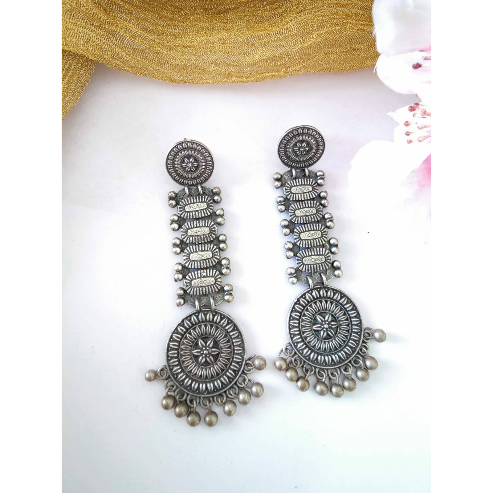 This is a beautiful pair of zircon stud earrings. The pack comes with one pair of beautiful studded oxidized earrings. You can choose from any of the two options provided. This pair will work with any Indian or western outfit. Buy this for yourself or get it as a gift for your loved ones. Besides, you will also get an assured gift on every purchase.