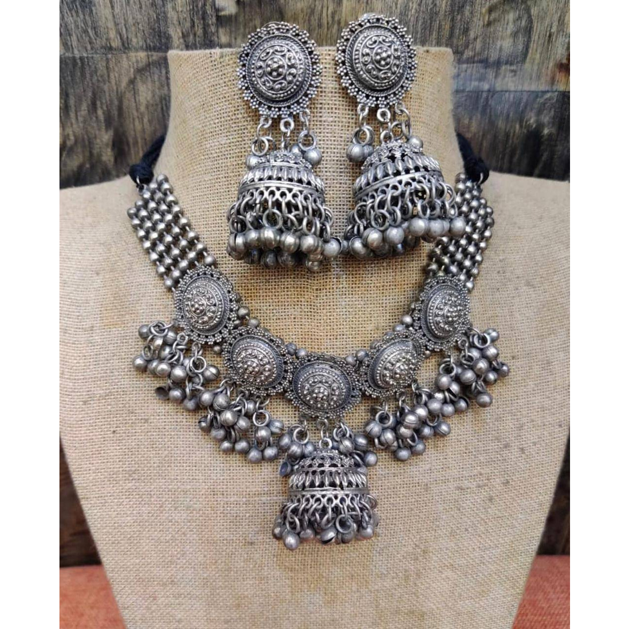 This set of 7 includes Ghungroo necklace, bangles, nosepin, dangler earrings, ring, anklets,  toe ringCelebrate every occasion with timeless pieces. Bringing you a unique box of Accessories that will brighten up your days in an instant Our Ghungroo Silver Oxidised Jewelry Set features a minimalist look. Each of these pieces is versatile and complements each other. Wear them together or separately, these are bound to shine Our Timely Treasures are the perfect gifts to give your loved ones or pa