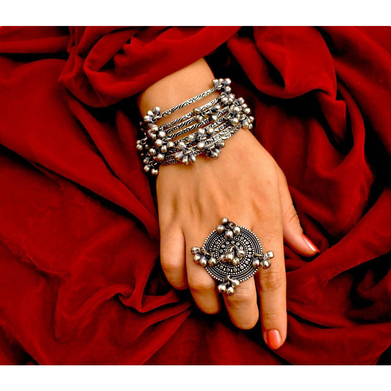 MATERIAL The metal is alloy with Oxidised German silver plating that gives a dull, yet classy finish to the set. The German silver plating used when combined with the design gives a uniquely traditional look to the jewelry set. The metal is strong and long-lasting.OCCASION Will add lustre when worn for a wedding, engagement, party, prom and any special occasion. Will enhance special days like Valentine's day, Birthdays, Anniversaries, and Mother's Day.CARE INSTRUCTION  Avoid Heat & Chemicals