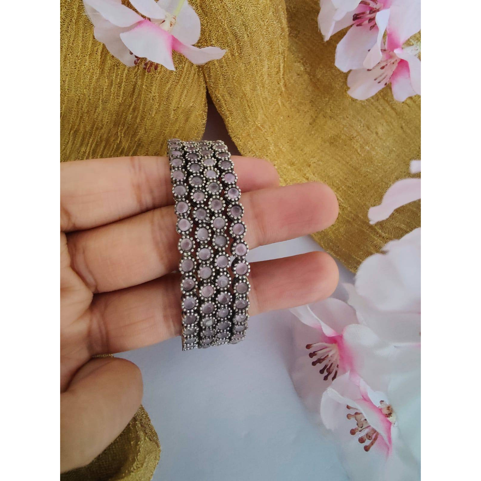 Add a hint of flamboyance to your outfit with these intricately designed and handcrafted high quality afghani glass rings.Wear this beautiful statement ring to become a head turnerItem DescriptionThe look is stunning and preciously suitable for all kinds of dressy occasions.COLOR  SilverMetal Brass With Good Quality Silver PlatedFor - Girls & WomenOCCASION PARTY WEAR , WEDDING, MARRIAGES, CASUAL, DAILY WEARIdeal For GiftingCare Instruction  Avoid Heat & Chemicals Like perfume, Deo, Alchol,