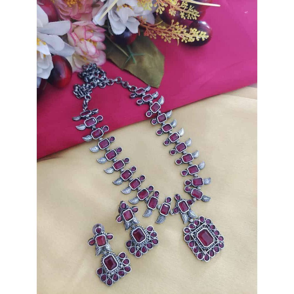 Step out in style with this beautiful oxidised silver plated dangler earrings, which have been given a drop designer dangler perfectly designed. It will add bling to your look. Simple yet standout design made for the Modern Indian woman who likes to add a bit of tradition to her everyday looks. The beautifully placed stones enhance the design story of the piece and add to its versatility. Style this delightful pair to work and take it beyond as it pairs well with almost any attire.Metal Brass W