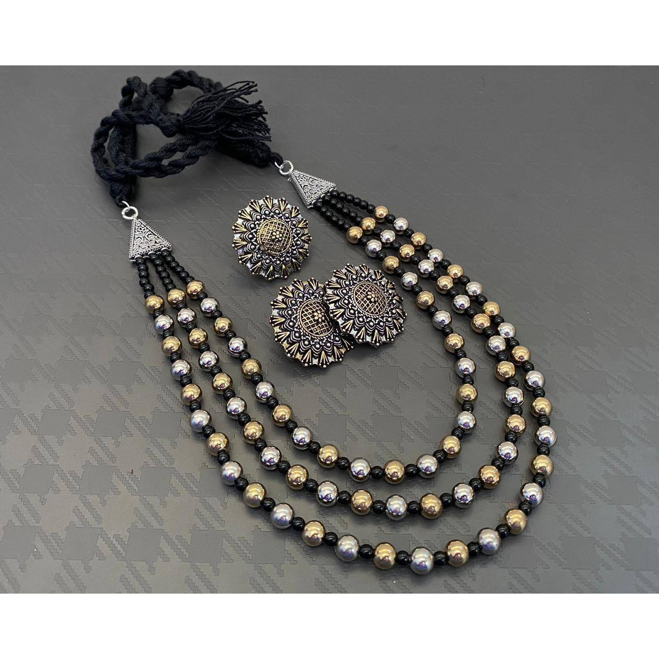 This Exotic Oxidised Chandelier Earring For Women is made of Alloy. Women love jewellery specially traditional jewellery adore a women. They wear it on different occasion. They have special importance on ring ceremony, wedding and festive time. They can also wear it on regular basics. Make your moment memorable with this range. This jewel set features a unique one of a kind traditional embellish with antic finish.Premium quality