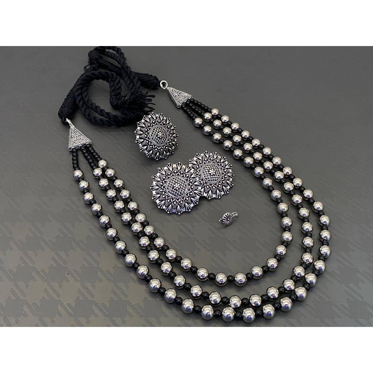 This Exotic Oxidised Chandelier Earring For Women is made of Alloy. Women love jewellery specially traditional jewellery adore a women. They wear it on different occasion. They have special importance on ring ceremony, wedding and festive time. They can also wear it on regular basics. Make your moment memorable with this range. This jewel set features a unique one of a kind traditional embellish with antic finish.Premium quality