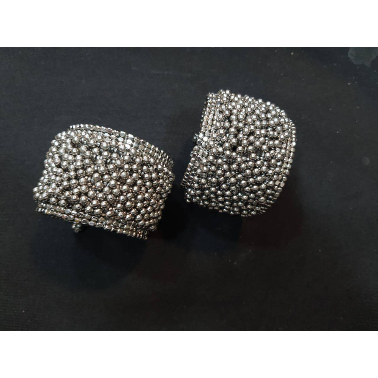 Step out in style with this beautiful oxidised silver plated earrings, which have been given a drop designer dangler perfectly designed. It will add bling to your look. This earring will go well with any of your ethnic outfits.