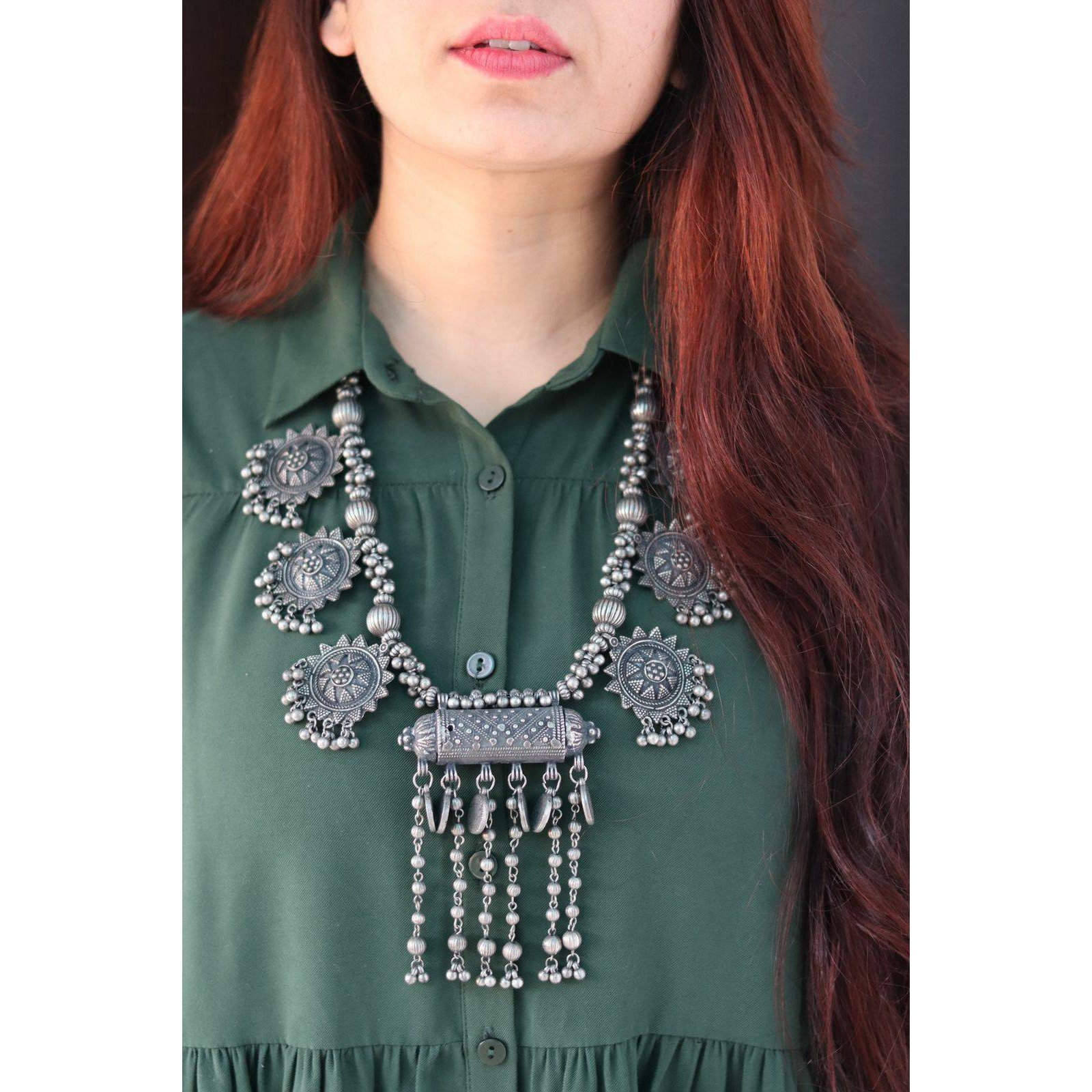 This beautiful set of 5 has a big long Haram necklace, pair of jhumka earrings, a ring,Bracelet , and a nose pin.Grab this beautiful set with any of the ethnic/ Indo western outfit and look unique in the crowdPremium quality setJewelry Care GuideEach piece of our jewelry is handcrafted and therefore delicate. Please take care of your jewelry so you can enjoy them for a long time. These jewelry are made of German silver, Cotton beads, shells, Chemical beads, and onyx beads.* Perfume, deodorant