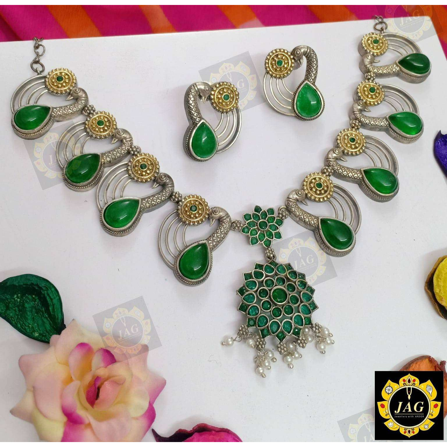 Infuse your beauty and charisma into your everyday life with this stunning dual Tone oxidized jewelry set, which includes a dual-tone long necklace, oxidized earrings, oxidized bangles, rings, and a nose pin combination. Make a fashion statement by wearing it with everything from a saree to a t-shirt and jeans. This oxidized jewelry is perfect for both day and night. Buy this Indian silver jewelry from Vastrabhushan today. You may buy it for yourself or even gift to someone you admire. Remember