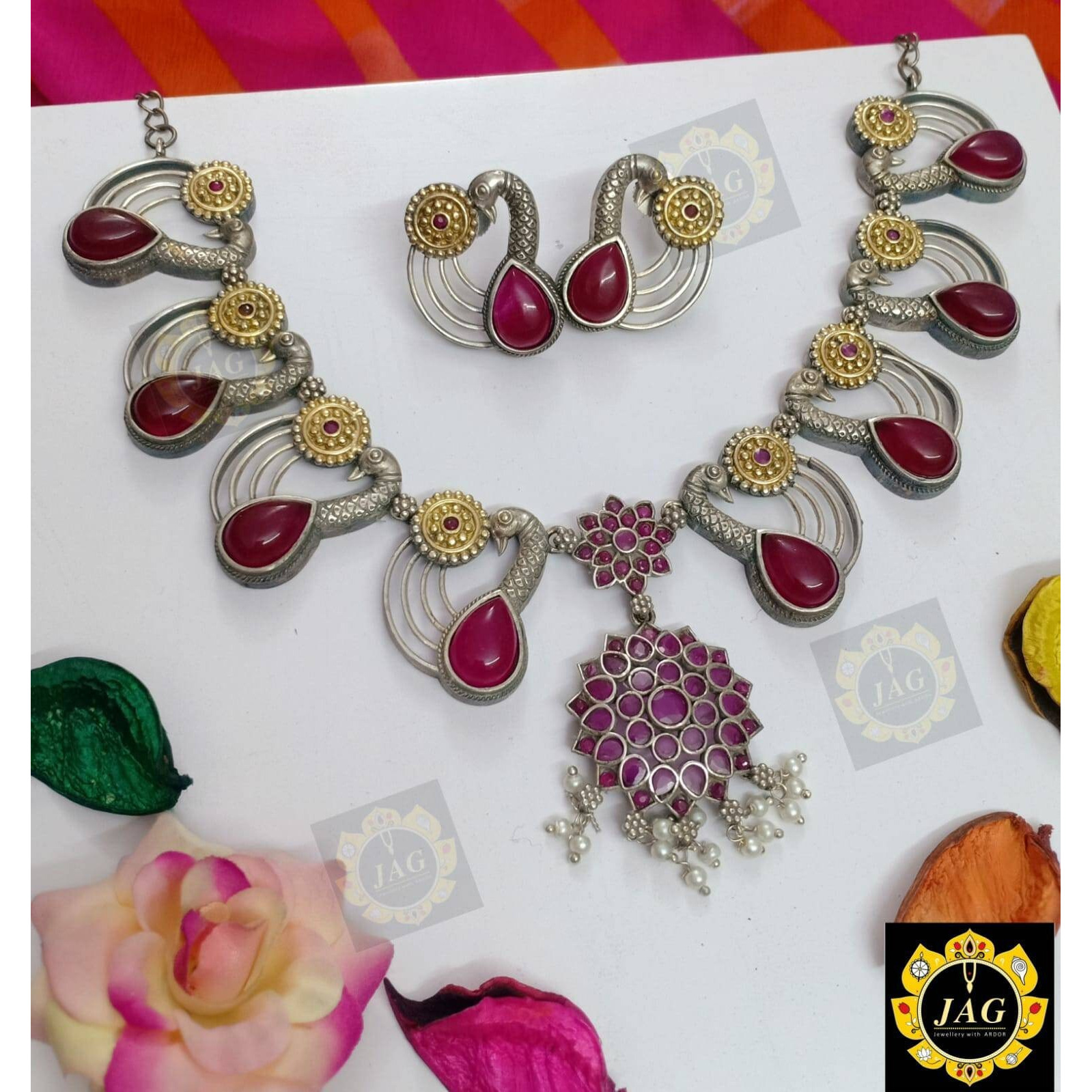 Infuse your beauty and charisma into your everyday life with this stunning dual Tone oxidized jewelry set, which includes a dual-tone long necklace, oxidized earrings, oxidized bangles, rings, and a nose pin combination. Make a fashion statement by wearing it with everything from a saree to a t-shirt and jeans. This oxidized jewelry is perfect for both day and night. Buy this Indian silver jewelry from Vastrabhushan today. You may buy it for yourself or even gift to someone you admire. Remember