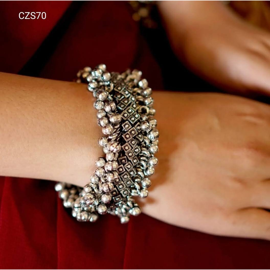 *New Collection* Long Haram & Short Choker combo with beautiful Jhumka Earrings, Ring & Nosepiece and Premium Quality Bangles *Adorn your beautiful personality with this exquisitely designed and handcrafted necklace in high quality German Silver. Pair it up with any casual,semi formal or formal attire for that traditional yet contemporary look.Premium quality
