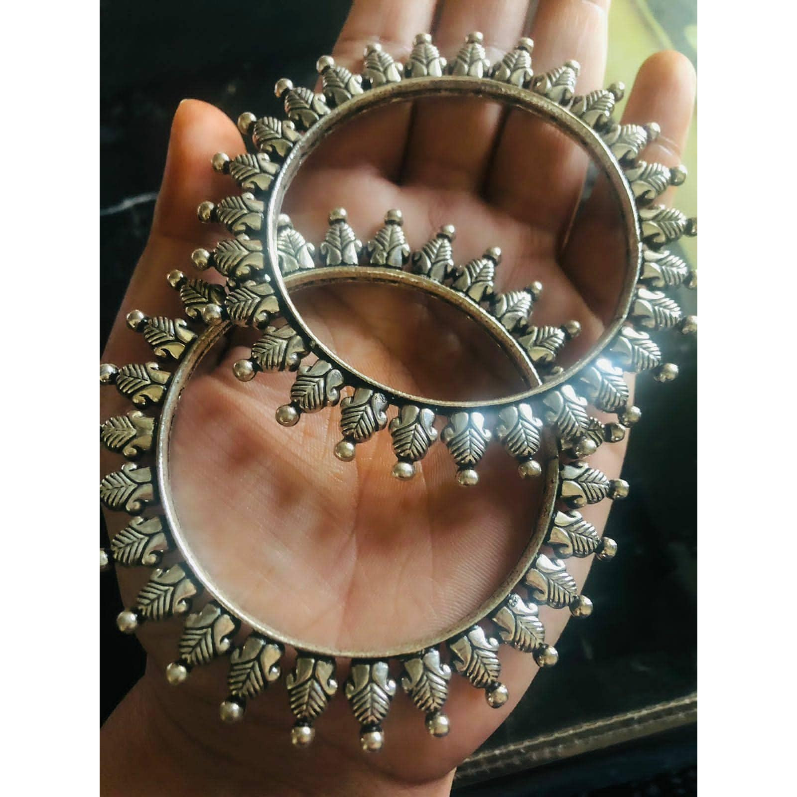 Vastrabhushan is one-of-a-kind Indian oxidized bangles are the OGs in your jewellery boxThese traditional baraat kadas are moulded with German oxidized silver to add a charm and class to a monotonous outfit. Available in 4 different styles, get one or many that fit your need. From silver kadas to broad SLA kadas,we have got it allThese antique-looking silver kada are perfect for weddings, festivecelebrations, and even for regular use. They are also an excellent present or gift for yourloved on