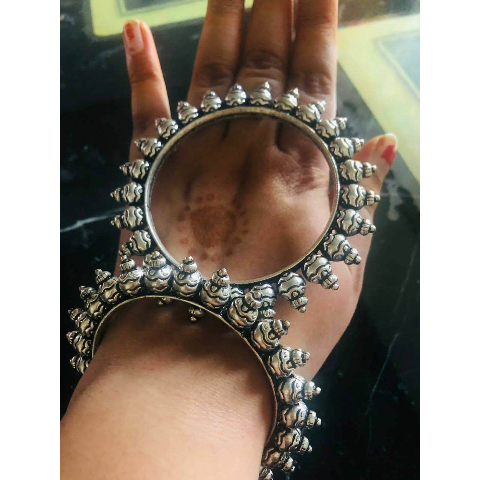 Vastrabhushan is one-of-a-kind Indian oxidized bangles are the OGs in your jewellery boxThese traditional baraat kadas are moulded with German oxidized silver to add a charm and class to a monotonous outfit. Available in 4 different styles, get one or many that fit your need. From silver kadas to broad SLA kadas,we have got it allThese antique-looking silver kada are perfect for weddings, festivecelebrations, and even for regular use. They are also an excellent present or gift for yourloved on