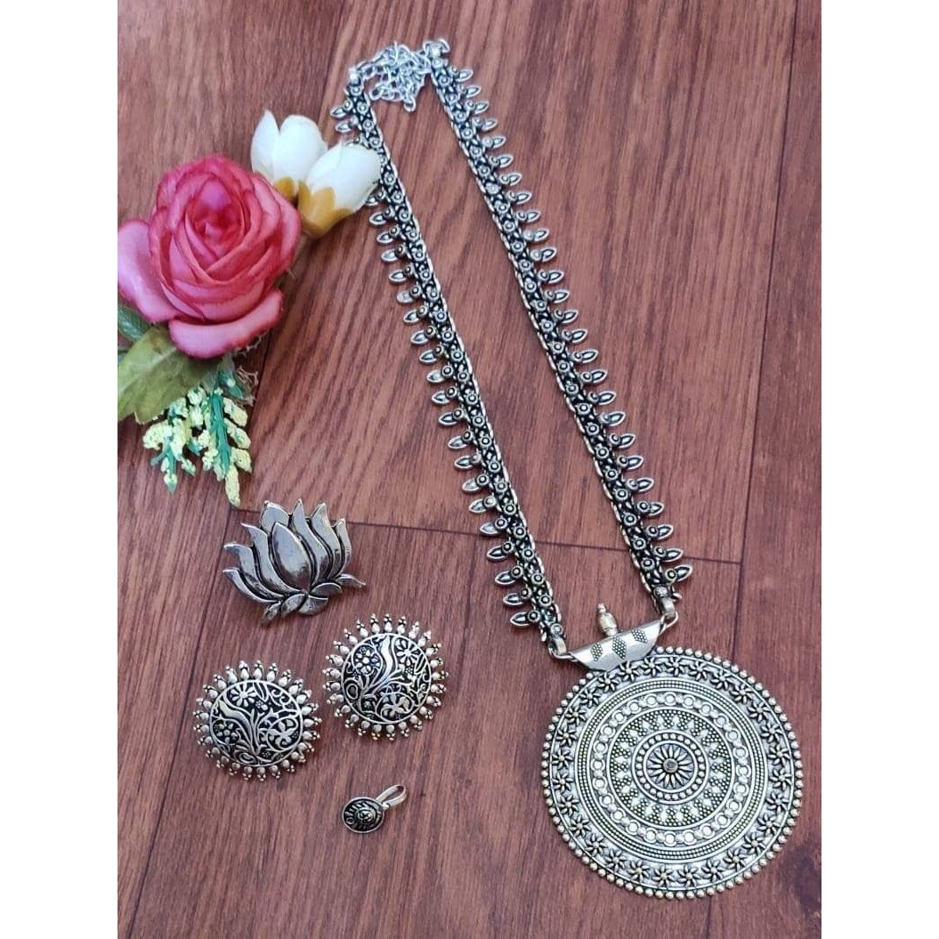 This beautiful set of 6 has a big long Haram necklace with a choker silver necklace, pair of jhumka earrings, a ring,pair of bangles, and a nose pin.Grab this beautiful set with any of the ethnic/ Indo western outfit and look unique in the crowdPremium quality set