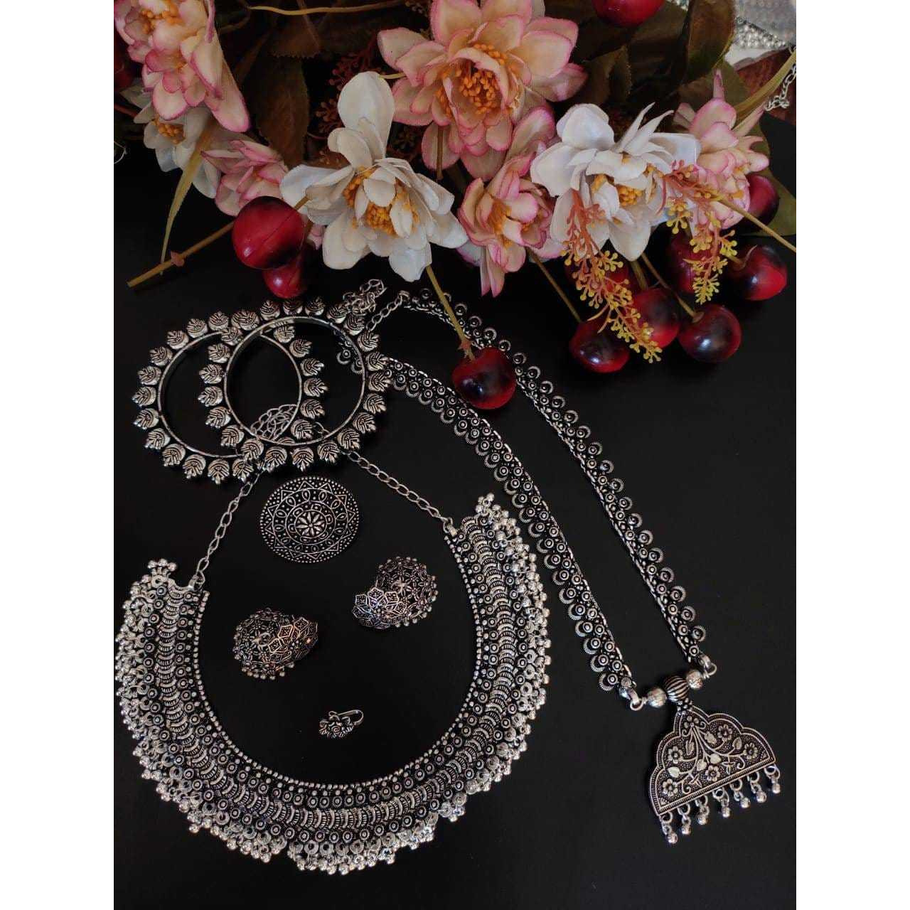This beauty set of 6 includes long necklace, short necklace, ring, nose pin, bracelet and pair of earrings. Shop this unique antique looking set handcrafted with love by the experienced craftsmen just for you. you can pair the set with ethnic attire as well as casual to have a statement fusion look.Premium quality