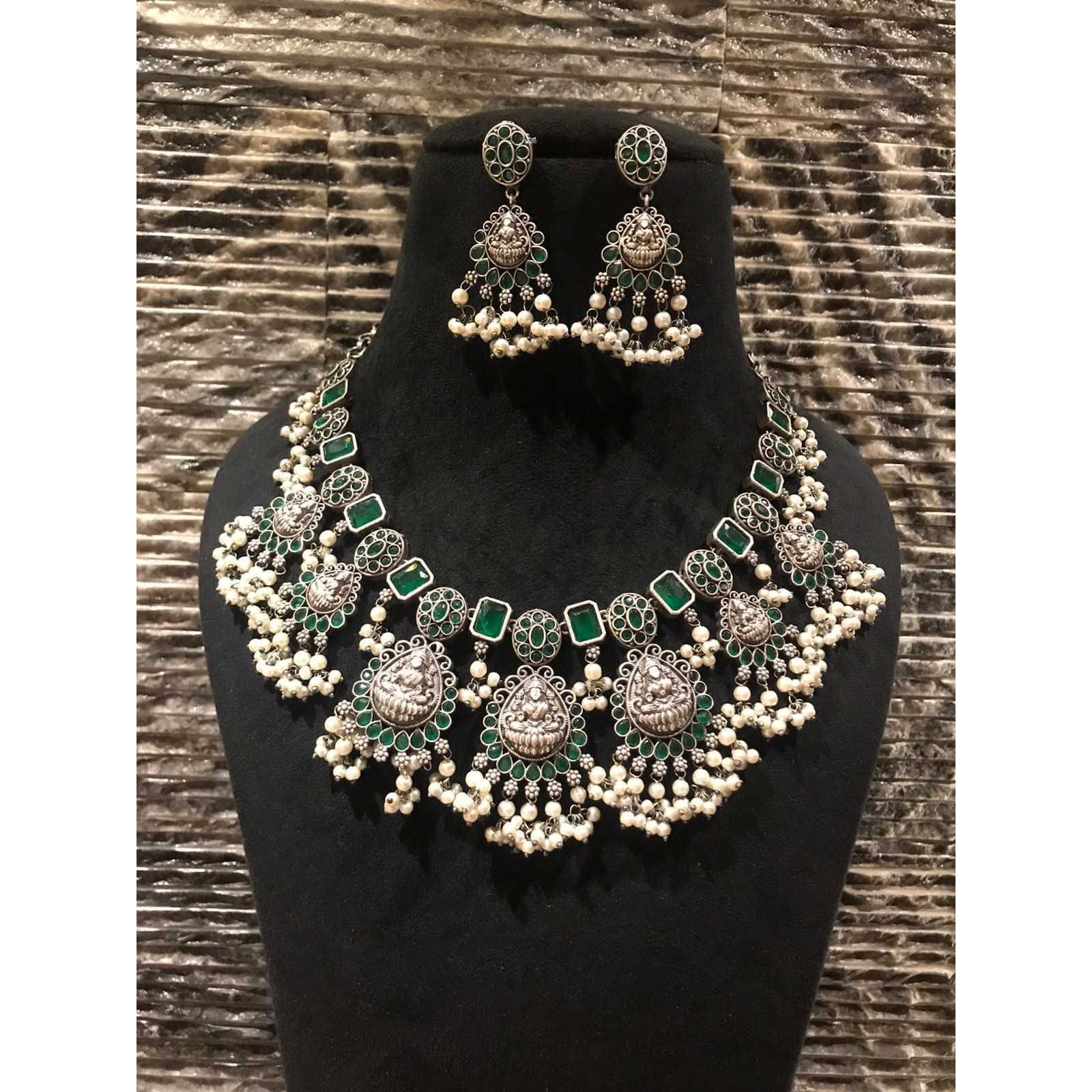 It is easy to see why oxidized jewelry has gained popularity. Not only does it have a unique look but it is versatile and cost-effective in comparison to purer metals like gold and silver. These pieces have an old-world charm and traditional appeal. These can be worn for a wedding, engagement, party, prom, and any special occasion. It will complement your special days like Valentine's Day, Birthdays, Anniversaries, and Mother's Day.This set includes a long necklace,choker necklace , jhumkis, nos