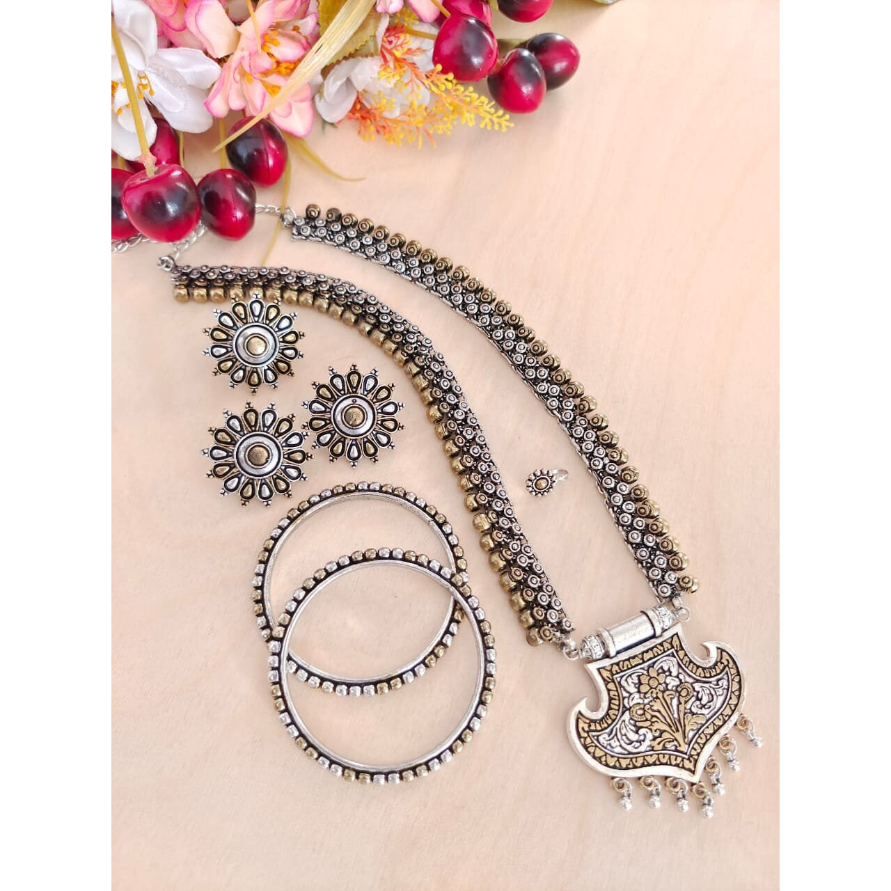 This Beautiful and colorful Ganesh dangler earrings from VASTRABHUSHAN comes with multicolor stone earrings set with pearls and will certainly leave you spellbound. This Necklace have an excellent finish and gives out an exquisite sense of style. If you are looking for an amazing Fashion Jewelry set for special occasions such as Anniversary, Engagement, Party, Wedding or for gifting , then your search ends here.Item DescriptionThe look is stunning and preciously suitable for all kinds of dressy
