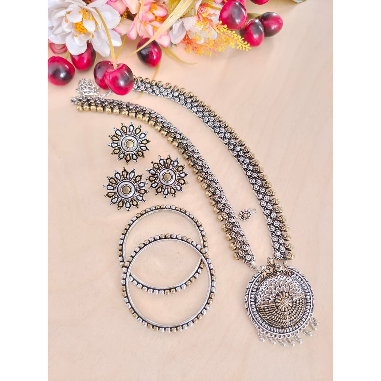 This Beautiful and colorful Ganesh dangler earrings from VASTRABHUSHAN comes with multicolor stone earrings set with pearls and will certainly leave you spellbound. This Necklace have an excellent finish and gives out an exquisite sense of style. If you are looking for an amazing Fashion Jewelry set for special occasions such as Anniversary, Engagement, Party, Wedding or for gifting , then your search ends here.Item DescriptionThe look is stunning and preciously suitable for all kinds of dressy