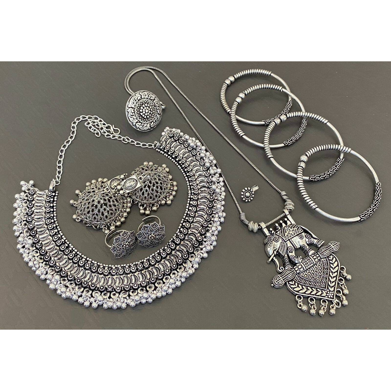 Add ethnicity and elegance to your beautiful personality with these exquisitely designed handmade earrings with pearls drop. The intricate designs gives these earrings a very classy touch. Wear them with any semi formal or casual attire and gather compliments all the way