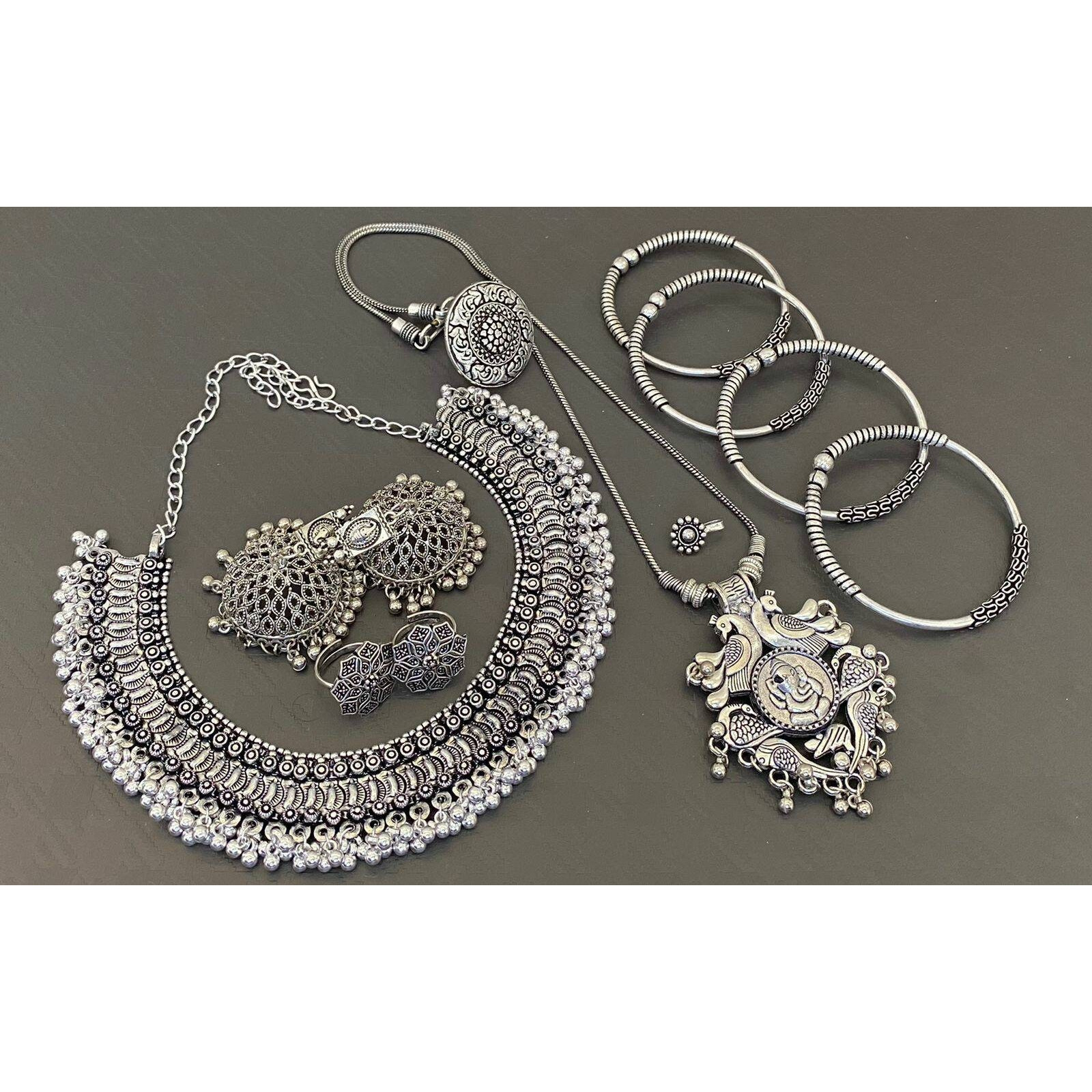Add ethnicity and elegance to your beautiful personality with these exquisitely designed handmade earrings with pearls drop. The intricate designs gives these earrings a very classy touch. Wear them with any semi formal or casual attire and gather compliments all the way