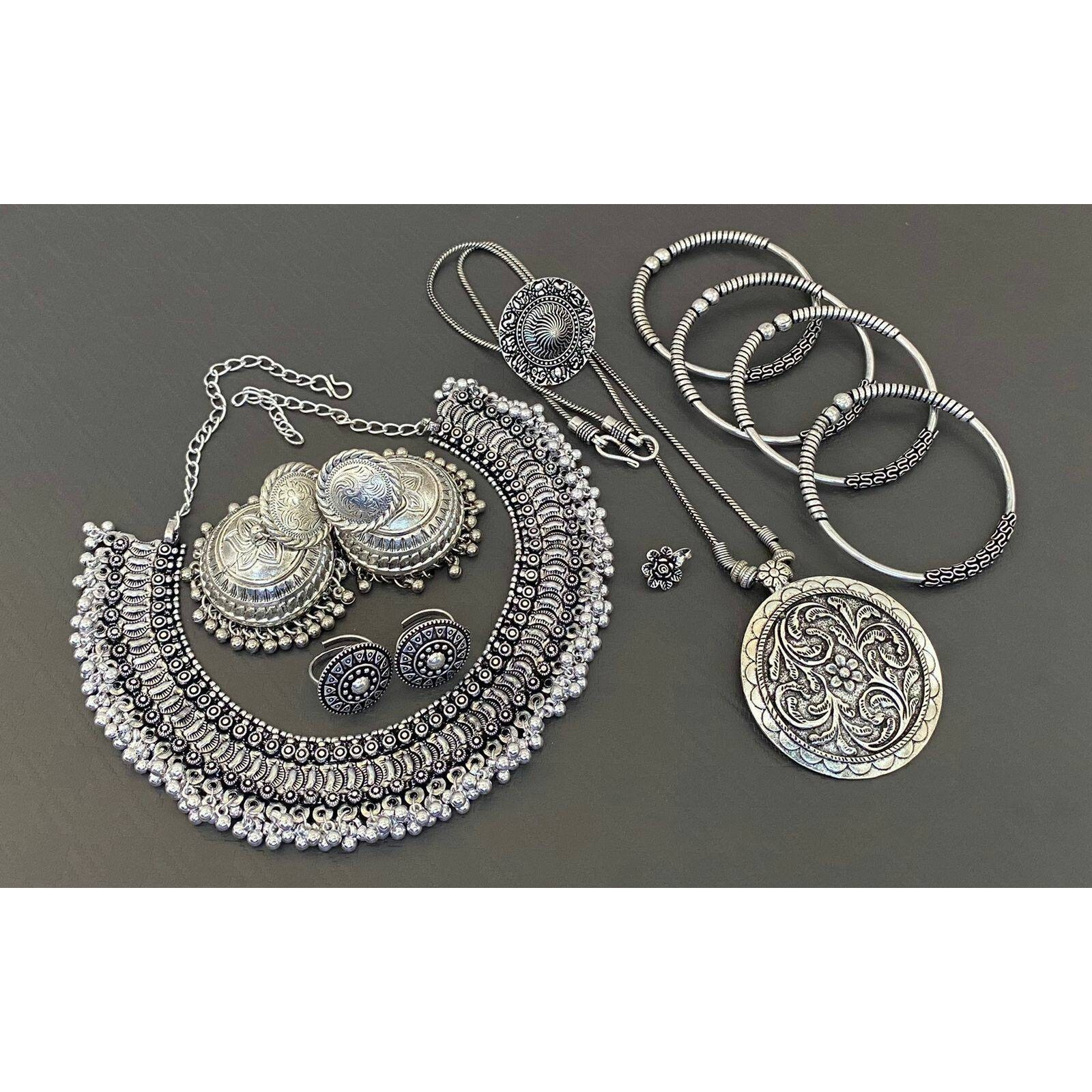 Add ethnicity and elegance to your beautiful personality with these exquisitely designed handmade earrings with pearls drop. The intricate designs gives these earrings a very classy touch. Wear them with any semi formal or casual attire and gather compliments all the way