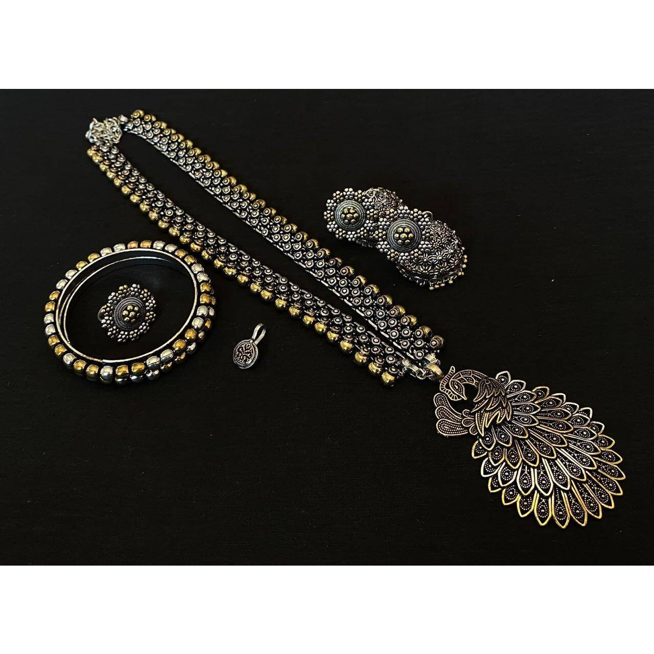 These beautiful peacock earrings in silver polish looks great with your casual/partywear dresses. All our earrings are handcrafted to perfection so that it can enhance the beauty of the woman.I am sure once you try you will always buy from us as we give genuine quality products, if you value quality then you can't miss these.