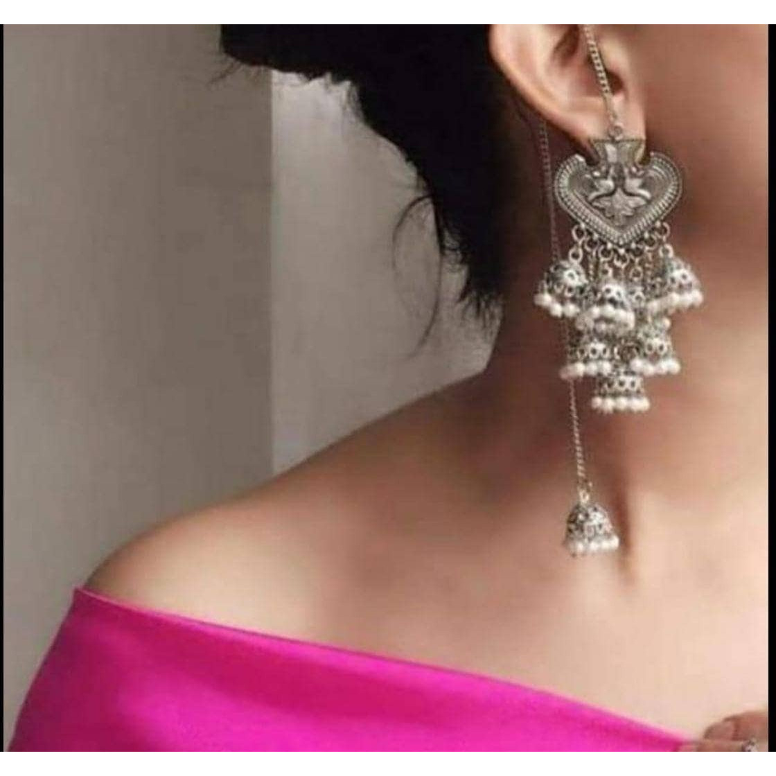 Add ethnicity and elegance to your beautiful personality with these exquisitely designed handmade earrings with pearls drop. The intricate designs gives these earrings a very classy touch. Wear them with any semi formal or casual attire and gather compliments all the way