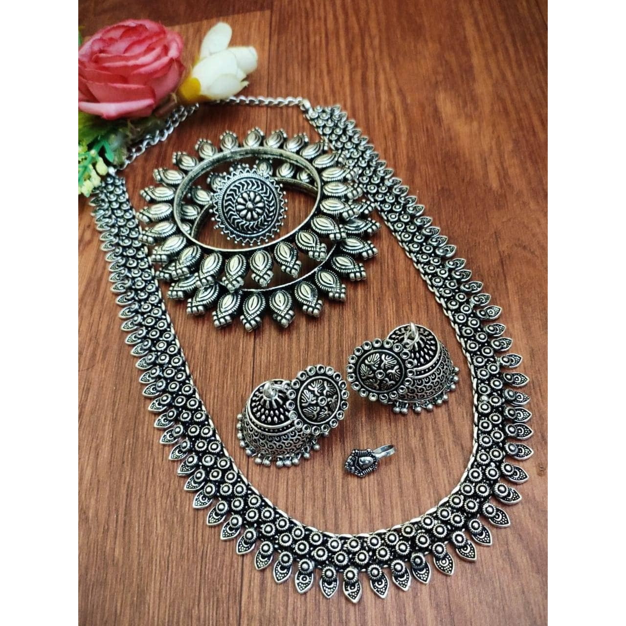 Adorn your beautiful personality with this exquisitely designed and handcrafted necklace in high quality German Silver. Pair it up with any casual,semi formal or formal attire for that traditional yet contemporary look.Premium quality