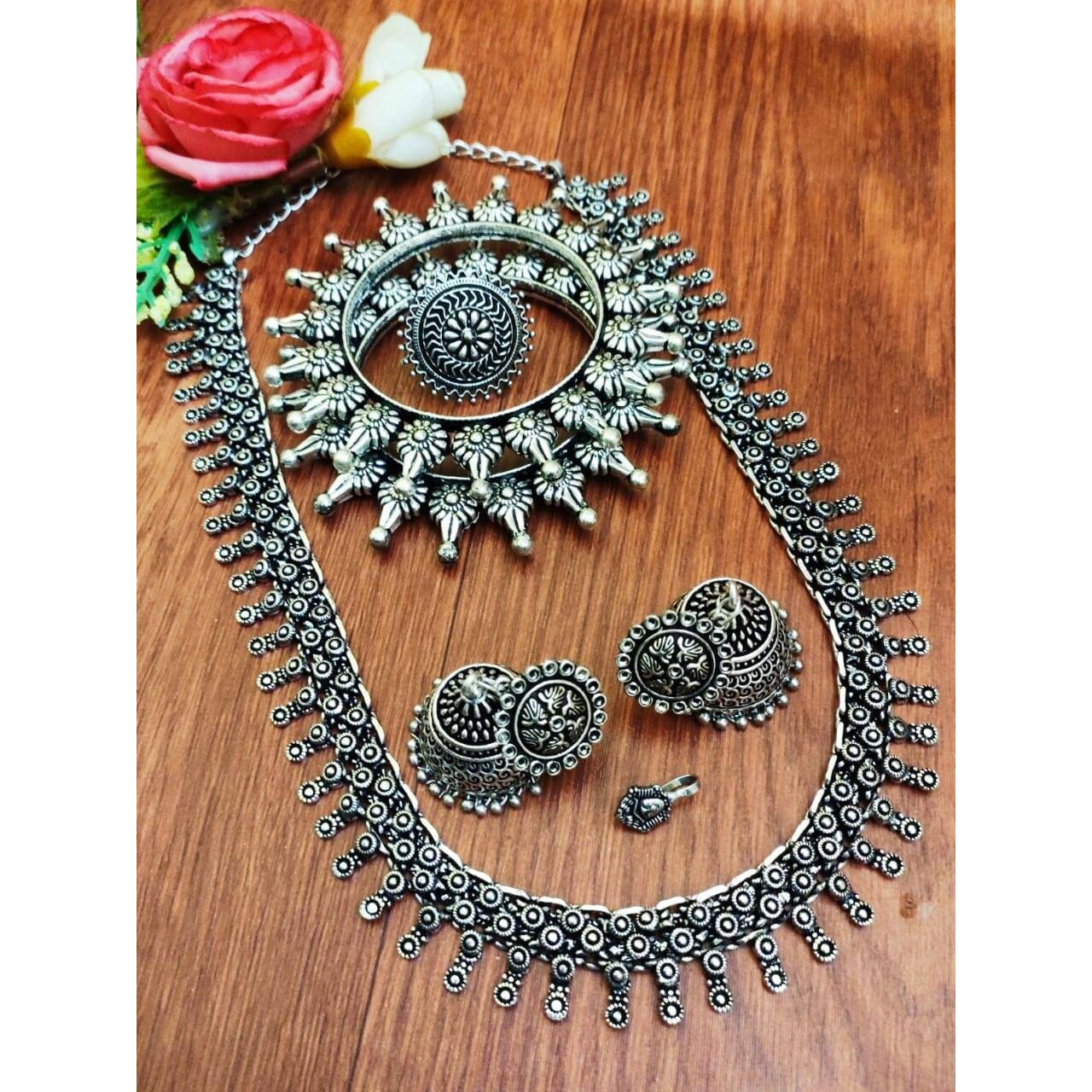 Adorn your beautiful personality with this exquisitely designed and handcrafted necklace in high quality German Silver. Pair it up with any casual,semi formal or formal attire for that traditional yet contemporary look.Premium quality