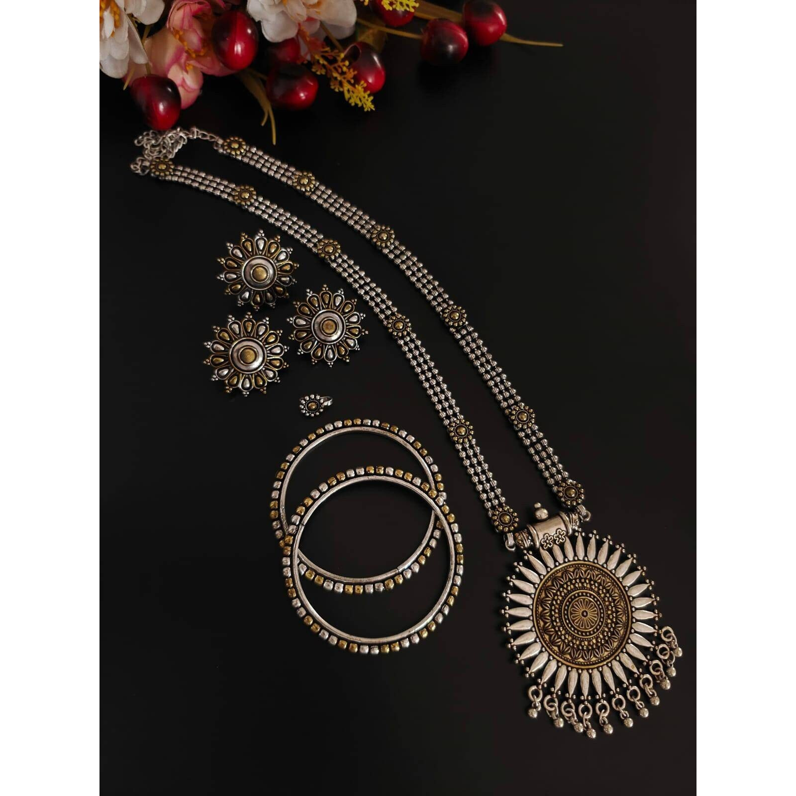 Rings are those quirky accessories that adds up to your style statement. This is where we present you the most stylish and vibrant collection of rings where you just cant go wrong. Get this beautiful spherical ring adored with a bunch of faux studs and beautiful art engraved over it. Make your presence felt with your stylish and elegant Rings.