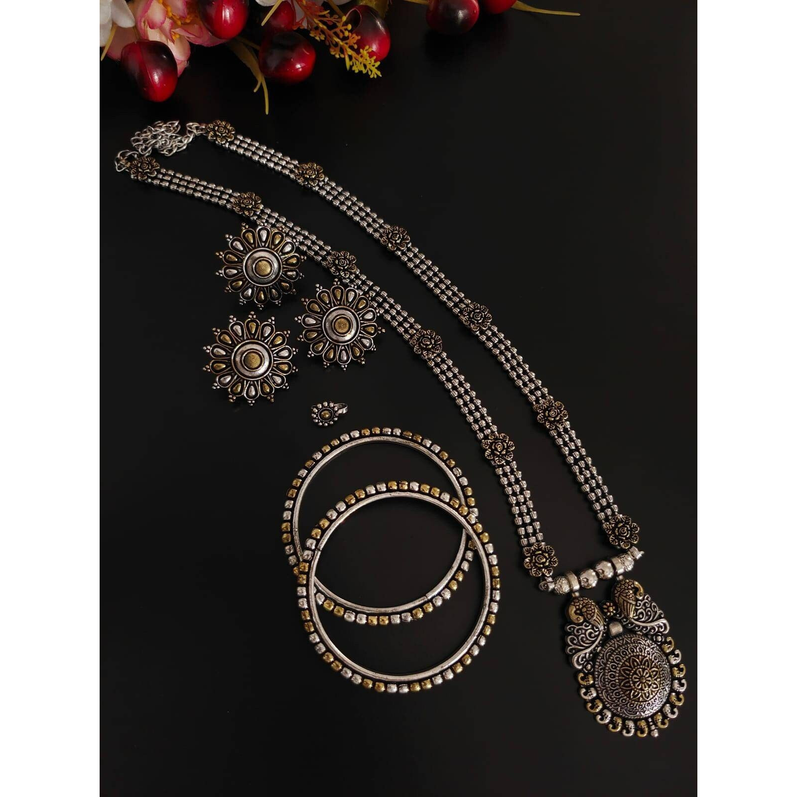 Rings are those quirky accessories that adds up to your style statement. This is where we present you the most stylish and vibrant collection of rings where you just cant go wrong. Get this beautiful spherical ring adored with a bunch of faux studs and beautiful art engraved over it. Make your presence felt with your stylish and elegant Rings.