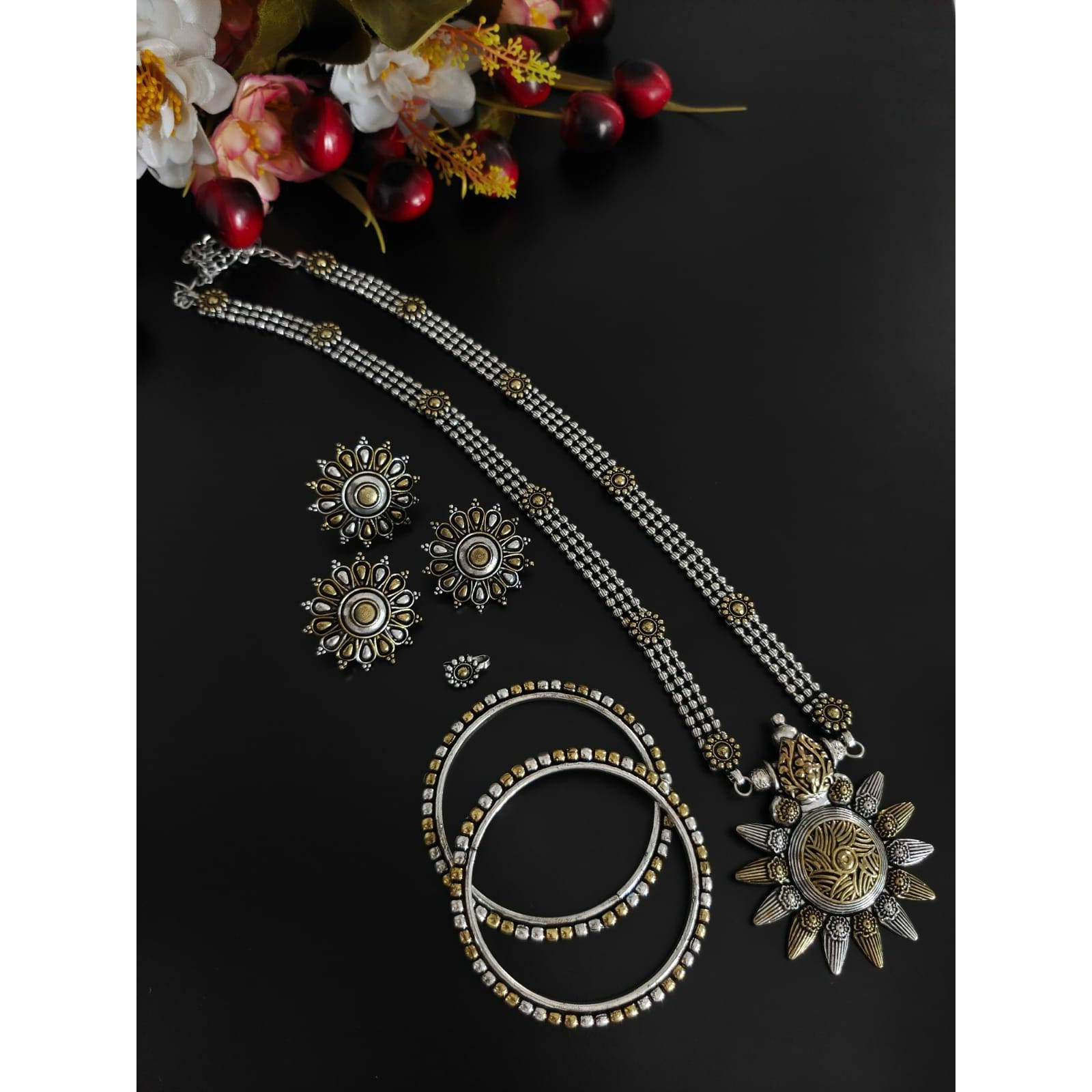 Rings are those quirky accessories that adds up to your style statement. This is where we present you the most stylish and vibrant collection of rings where you just cant go wrong. Get this beautiful spherical ring adored with a bunch of faux studs and beautiful art engraved over it. Make your presence felt with your stylish and elegant Rings.
