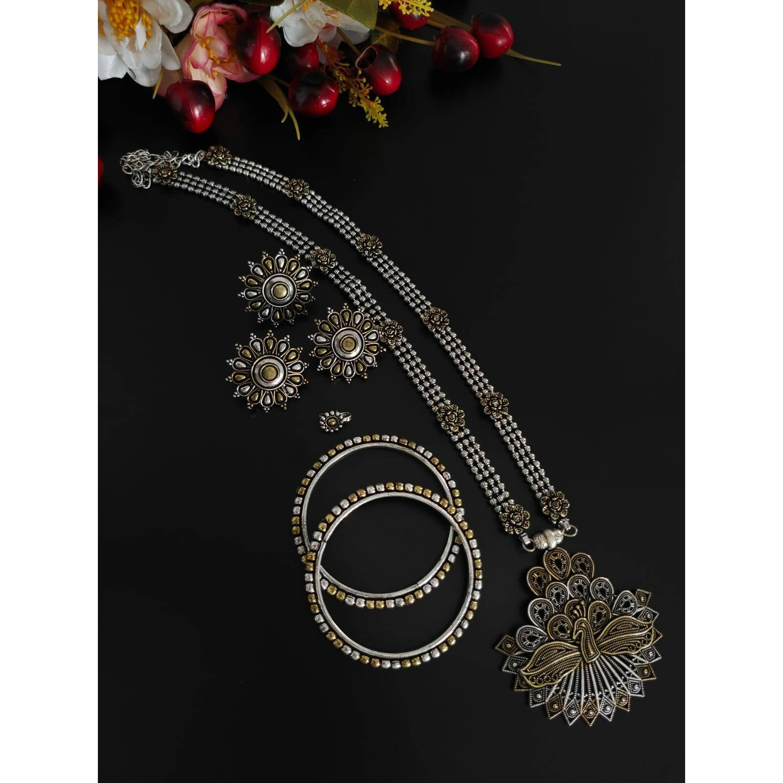 Rings are those quirky accessories that adds up to your style statement. This is where we present you the most stylish and vibrant collection of rings where you just cant go wrong. Get this beautiful spherical ring adored with a bunch of faux studs and beautiful art engraved over it. Make your presence felt with your stylish and elegant Rings.