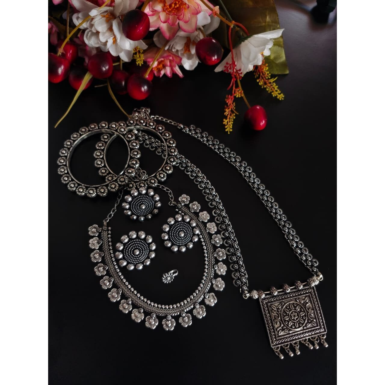This is a lovely piece of Indian jewelry that has been handcrafted and manufactured in India.The bangle has elephant motifs crafted on it that looks amazing. The rusted bracelet can beopened and thus fit to the size of your wrist. This artwork will be a treasure in your cabinet.When you buy this bangle, you will receive a free and guaranteed gift with every order.Care Instructions To keep the luster of the jewelry, clean it with a clean white tissue or towel.When cleaning the jewelry, avoid usi