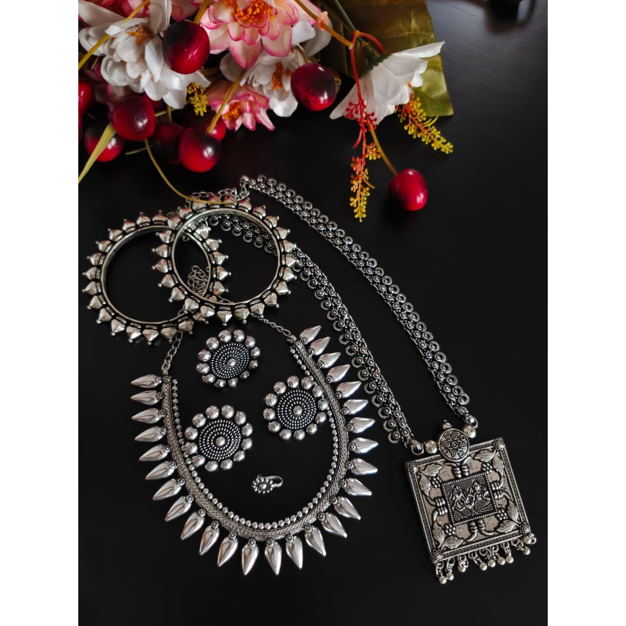 This is a lovely piece of Indian jewelry that has been handcrafted and manufactured in India.The bangle has elephant motifs crafted on it that looks amazing. The rusted bracelet can beopened and thus fit to the size of your wrist. This artwork will be a treasure in your cabinet.When you buy this bangle, you will receive a free and guaranteed gift with every order.Care Instructions To keep the luster of the jewelry, clean it with a clean white tissue or towel.When cleaning the jewelry, avoid usi