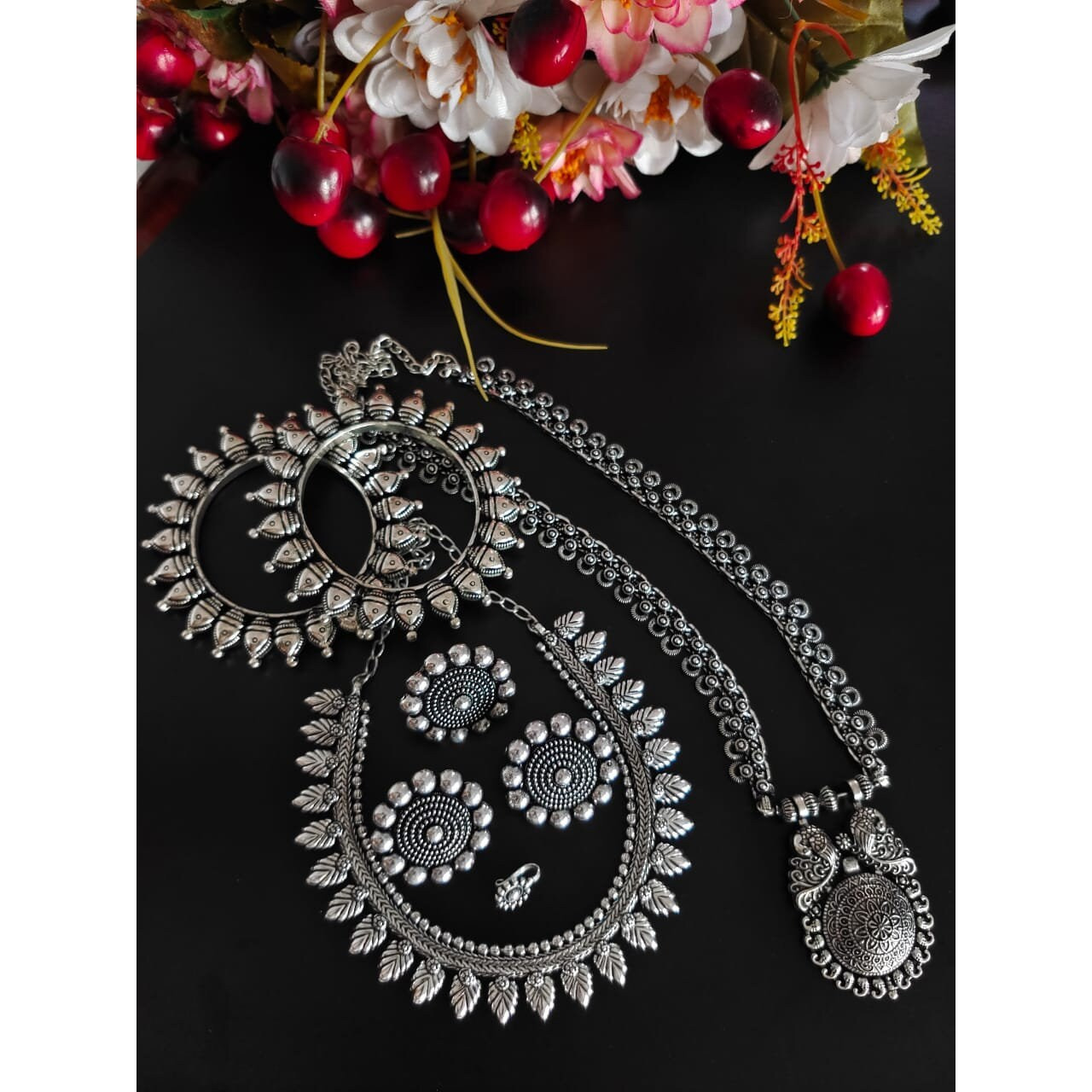 This is a lovely piece of Indian jewelry that has been handcrafted and manufactured in India.The bangle has elephant motifs crafted on it that looks amazing. The rusted bracelet can beopened and thus fit to the size of your wrist. This artwork will be a treasure in your cabinet.When you buy this bangle, you will receive a free and guaranteed gift with every order.Care Instructions To keep the luster of the jewelry, clean it with a clean white tissue or towel.When cleaning the jewelry, avoid usi