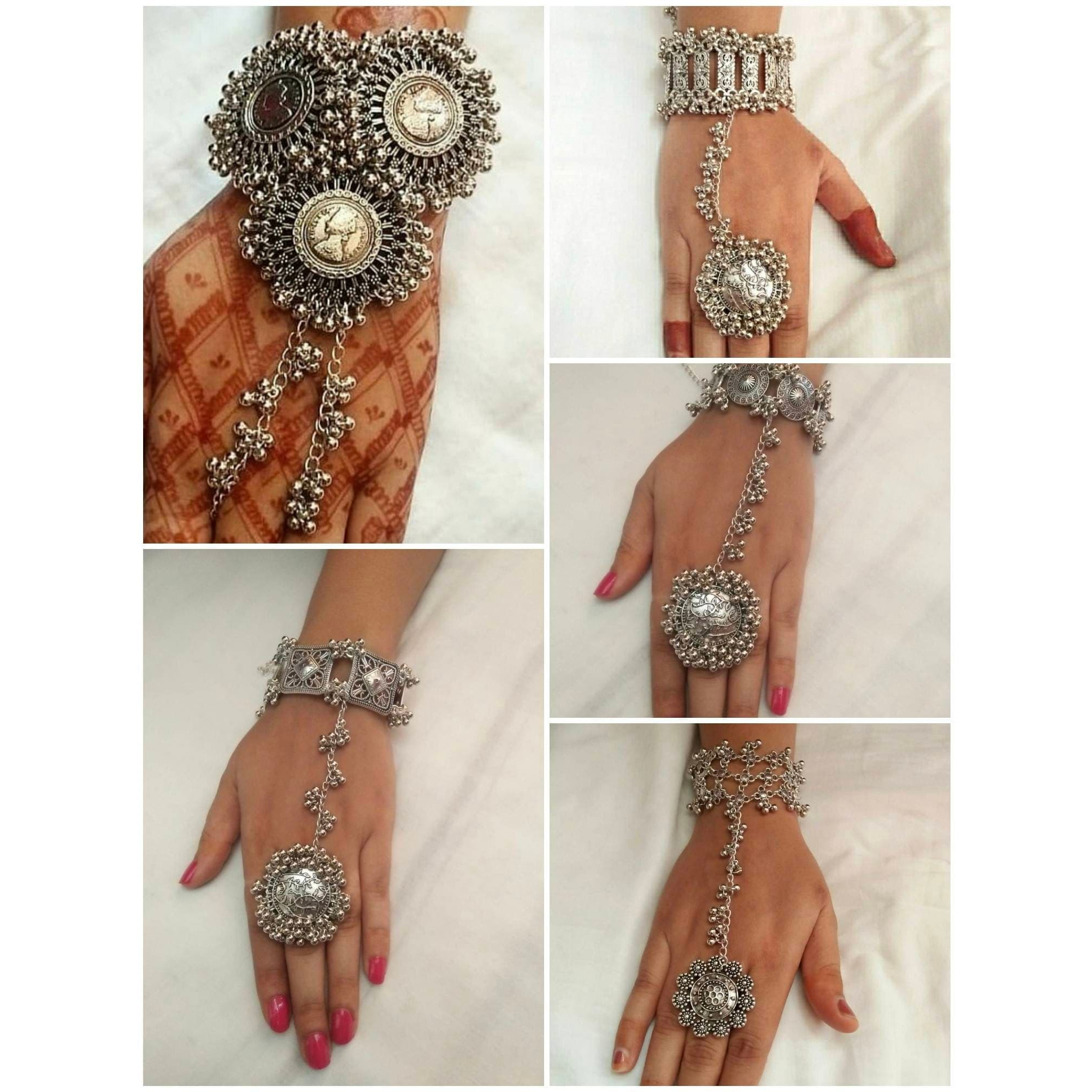 The oxidised bangle set, adorned with jhumkis by Vastrabhushan will leave you speechless. Incredibly well-made, this Navratri jewelry exudes elegance and sophistication. When it comes to important events like weddings, anniversaries, and engagements????????or even as a gift????????this alluring oxidized silver jewelry is your best bet! Radiant silver bangles are the ideal accessory for any evening event. It is certain to set you out in a crowded room. It is recommended to store oxidised jeweller