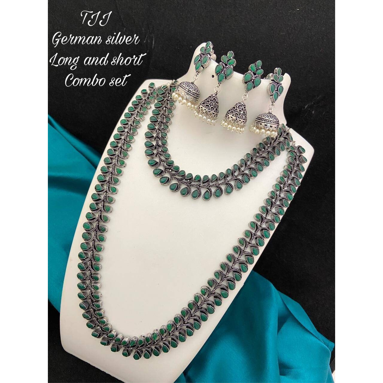 Are you looking to step up your ethnic look by a notch This oxidized silver jewelry is the perfect product for you. This set consists of an oxidized choker and a pair of jhumkas. The beautifully designed traditional jhumkas, paired with a touch of contemporary style on the choker, make this the bestseller combo. This set is a perfect fit forwedding jewelryand party wear. You can flaunt this set with an elegant saree or a gorgeous lehenga to make the jewelry shine. TheKundan earrings