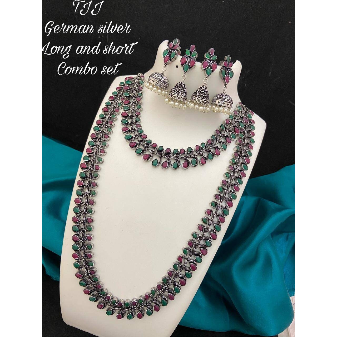 Are you looking to step up your ethnic look by a notch This oxidized silver jewelry is the perfect product for you. This set consists of an oxidized choker and a pair of jhumkas. The beautifully designed traditional jhumkas, paired with a touch of contemporary style on the choker, make this the bestseller combo. This set is a perfect fit forwedding jewelryand party wear. You can flaunt this set with an elegant saree or a gorgeous lehenga to make the jewelry shine. TheKundan earrings