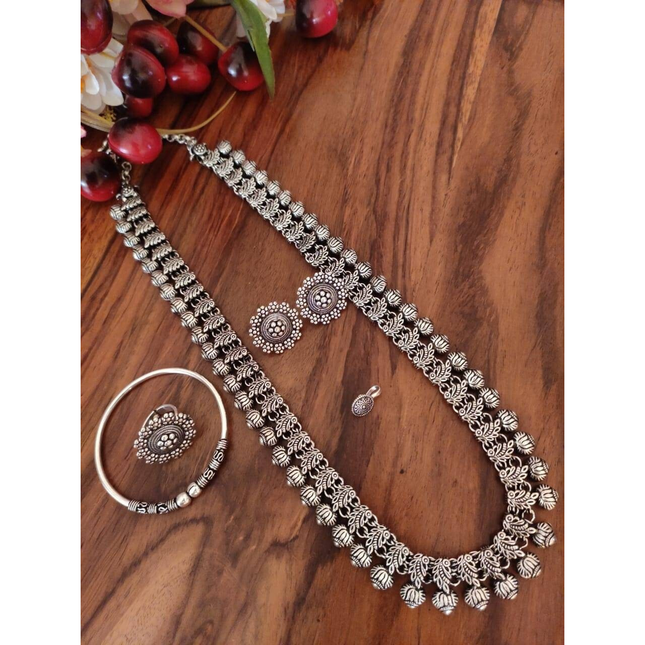 Step out in style with this beautiful oxidised silver plated earrings, which have been given a drop designer dangler perfectly designed. It will add bling to your look. This earring will go well with any of your ethnic outfits.