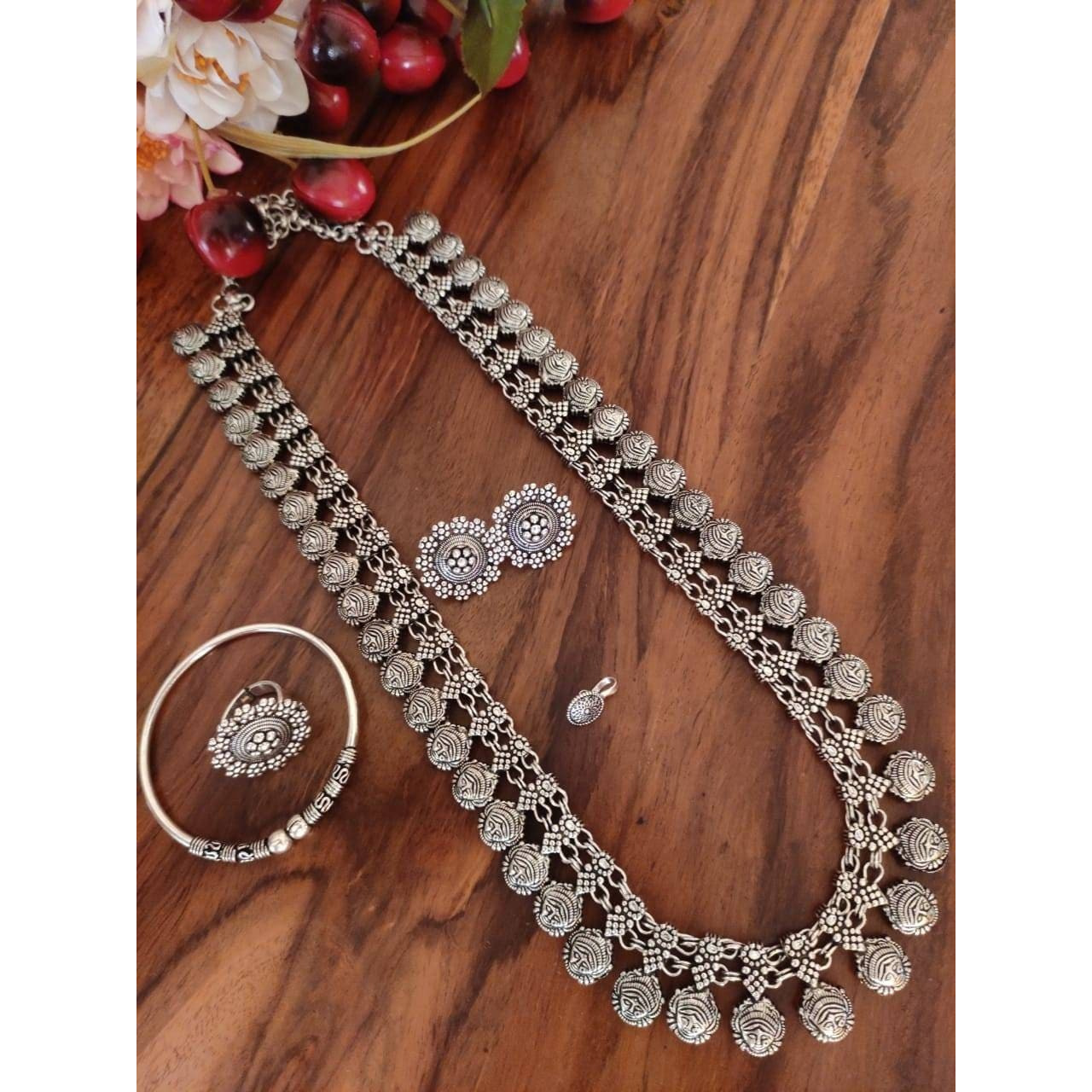 Step out in style with this beautiful oxidised silver plated earrings, which have been given a drop designer dangler perfectly designed. It will add bling to your look. This earring will go well with any of your ethnic outfits.