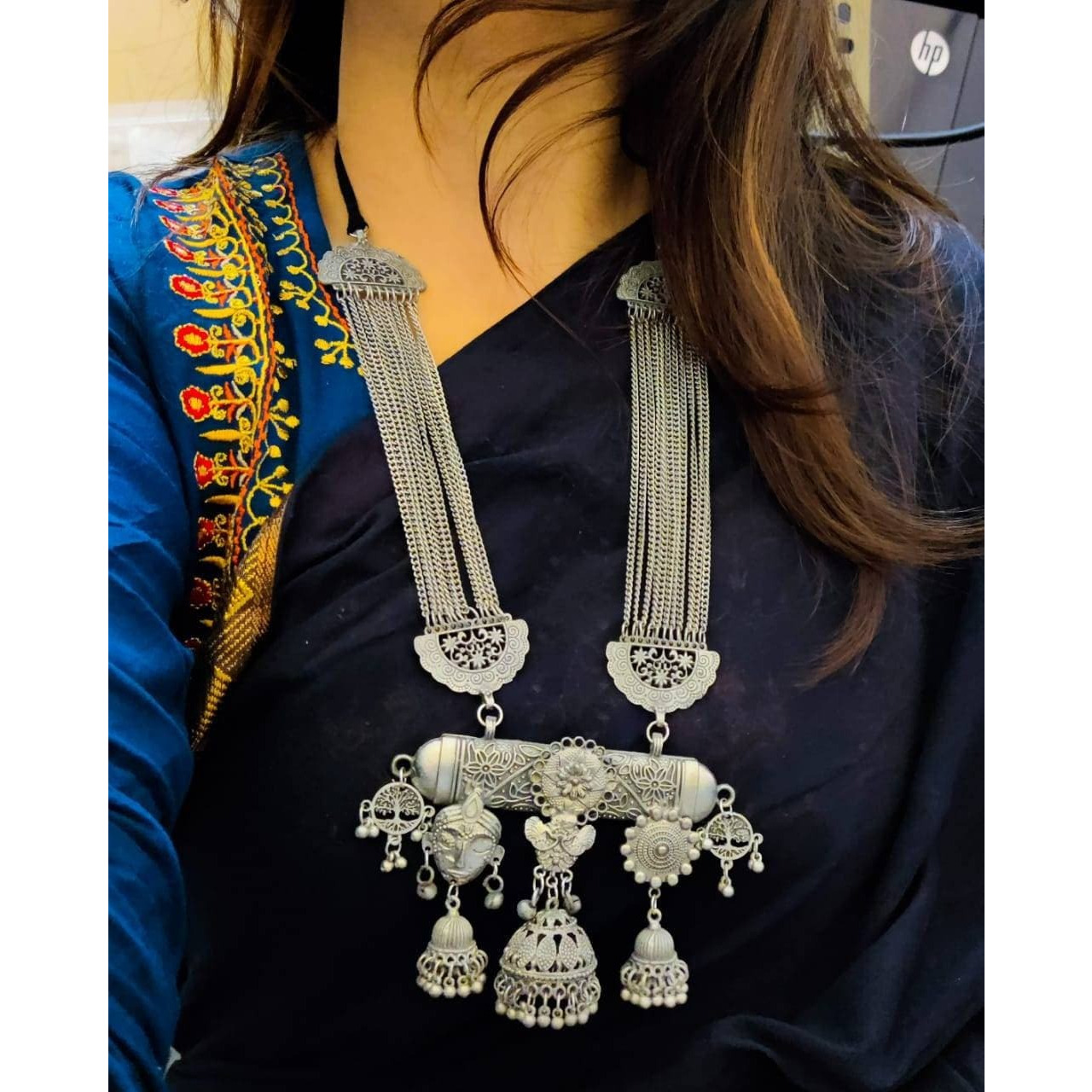Adorn your beautiful personality with this exquisitely designed and handcrafted necklace in high quality German Silver. Pair it up with any casual,semi formal or formal attire for that traditional yet contemporary look.Premium quality