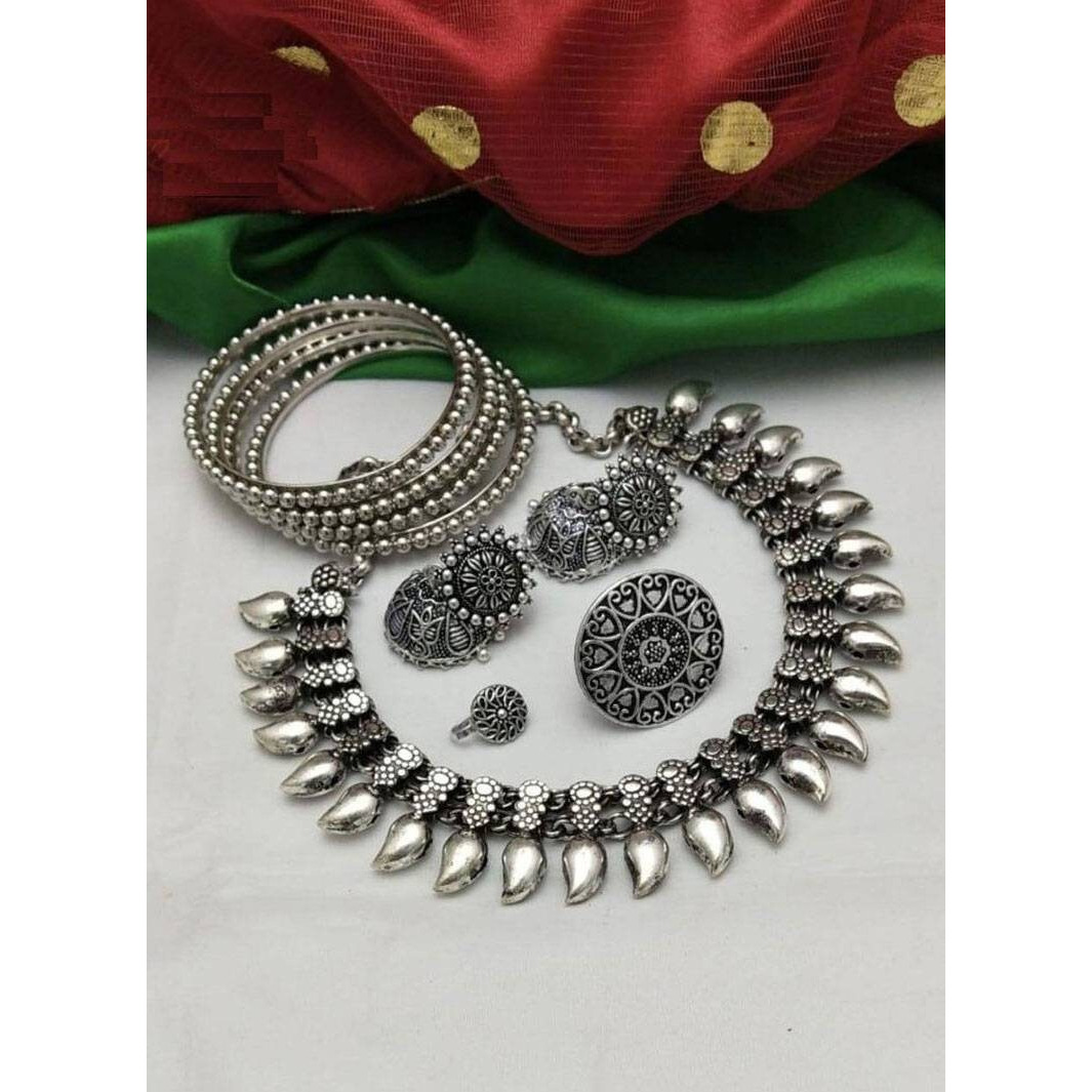 This beautiful oxidized Haath Phool is a part of Indian bridal jewelry. This Indian ethnic Haath Phool comes with an attached adjustable RingIt is easy to see why oxidized jewelry has gained popularity. Not only does it have a unique look but it is versatile and cost effective in comparison to purer metals like gold and silver. Oxidized metal comes in myriad patterns with stone work, delicate carving and enamelling to name a few. These pieces have an old world charm and traditional appealAmazing