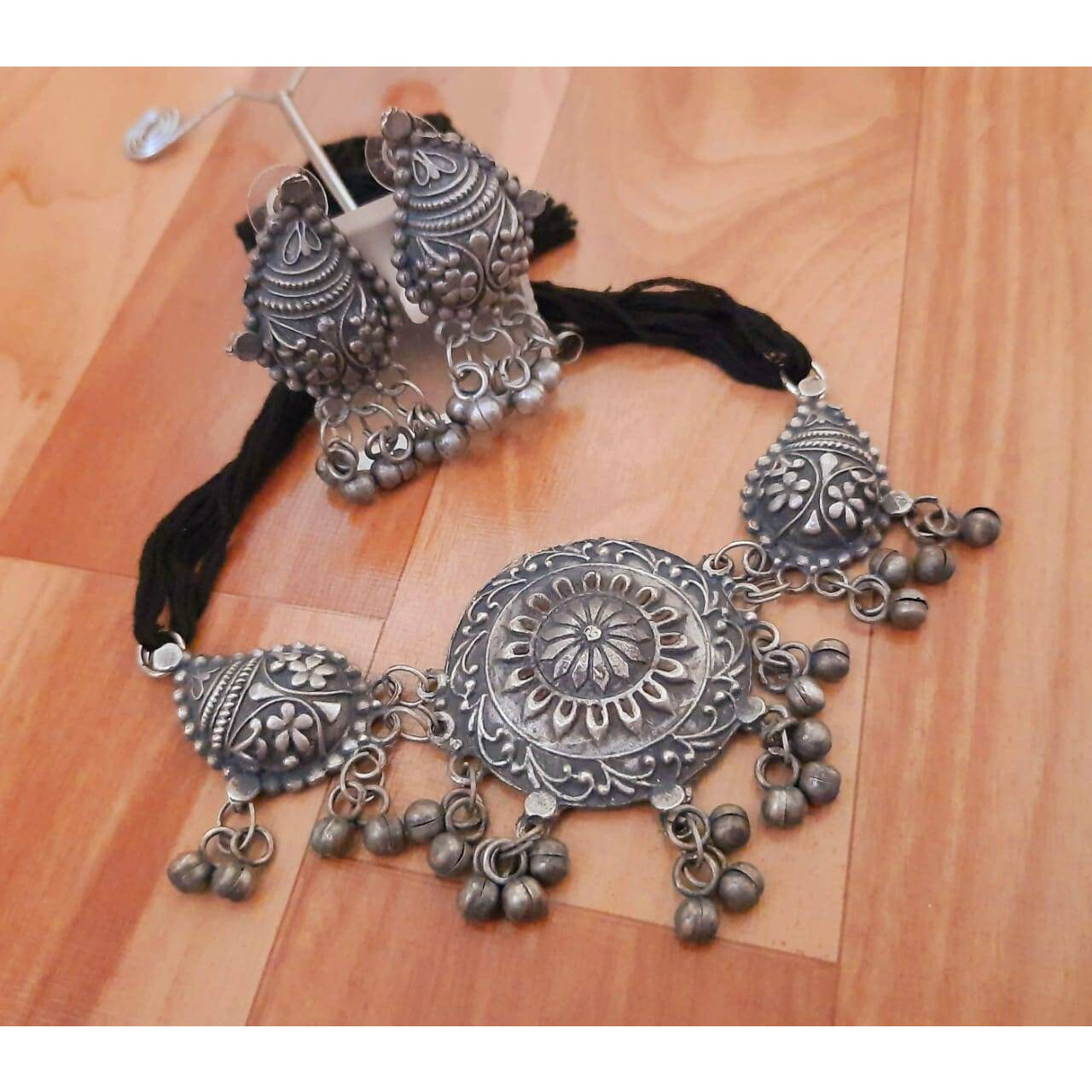Oxidised German Silver earrings in floral designs Indian Silver look Stone EarringsItem DescriptionOccasion  Wedding, Party Wear, Bridal, Perfect For Indian WeddingsOur Indian Earrings Is Oxidised Jewellery, Created With Careful Attention To Detail. These Earring Are Made From Solid German SIlver Which Gives It An Elegant Look And Feel. This Includes Matching Earring. This Floral Design Is Perfect For Parties And Functions As These Earring Are Specially Designed For Indian Beautiful Brides.All