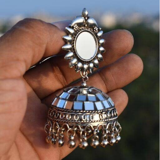 Ethnic wear has always been the first choice of Indian women and Vastrabhushan has taken greatcare to design elegant and beautiful Indian jewelry. The Oxidised Choker set with jhumka earringscan be matched with any saree or salwar suit of your choice. Whether you like to wear it for afestival or a wedding, you are surely going to win over hearts with this brilliant oxidized jewelry set.Its minimalist style and premium quality make it a great addition to your brass jewelry collection.Jewelry care